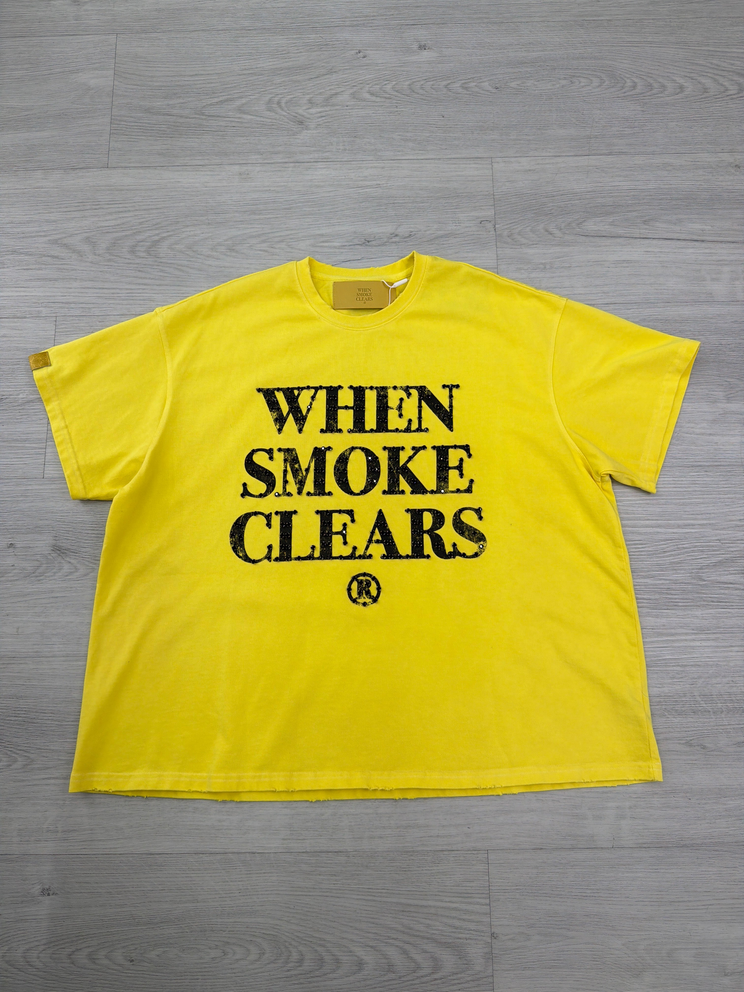 When smoke clears yellow black tee