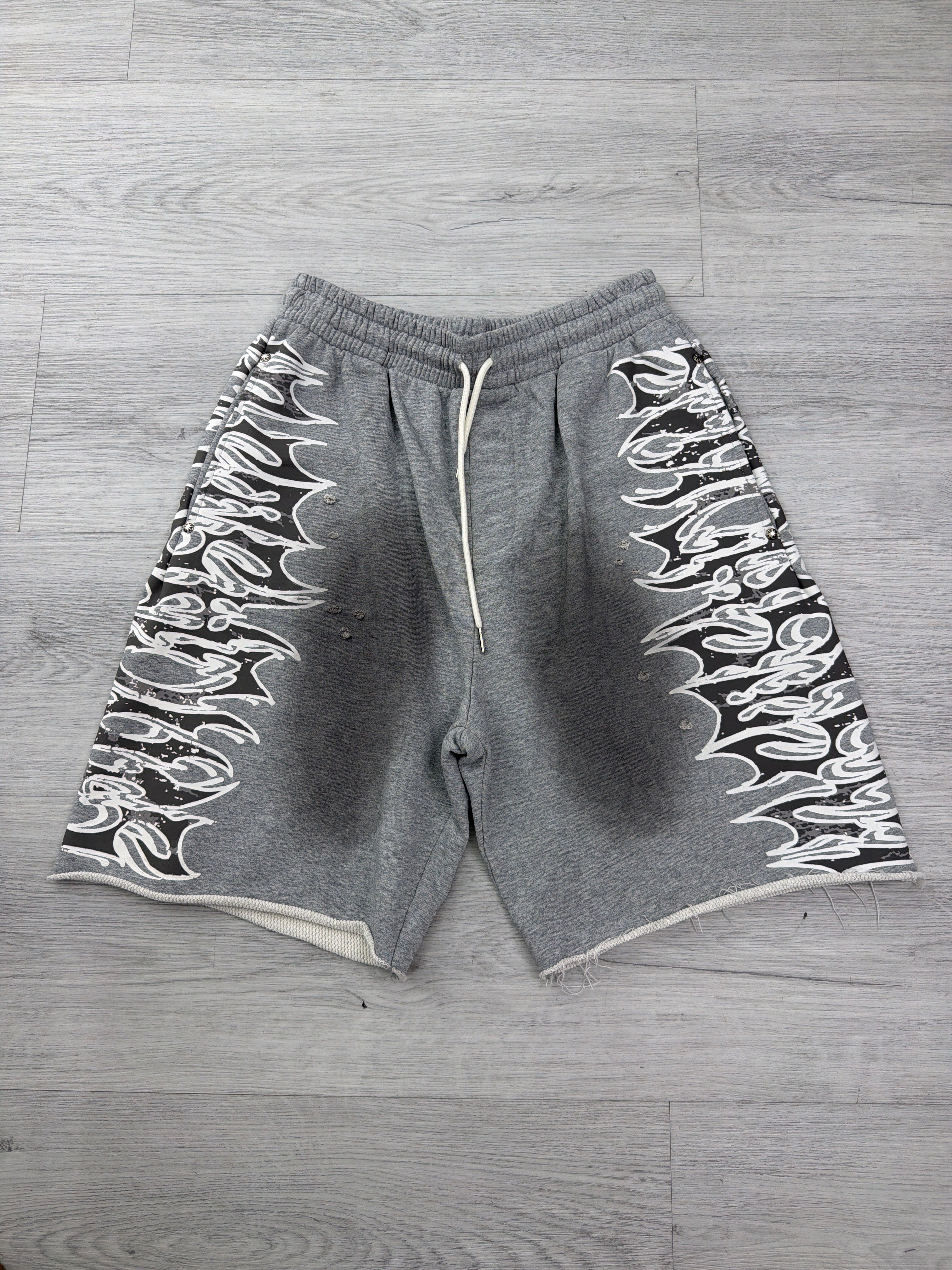 Lost shadow graphic sweatshort grey