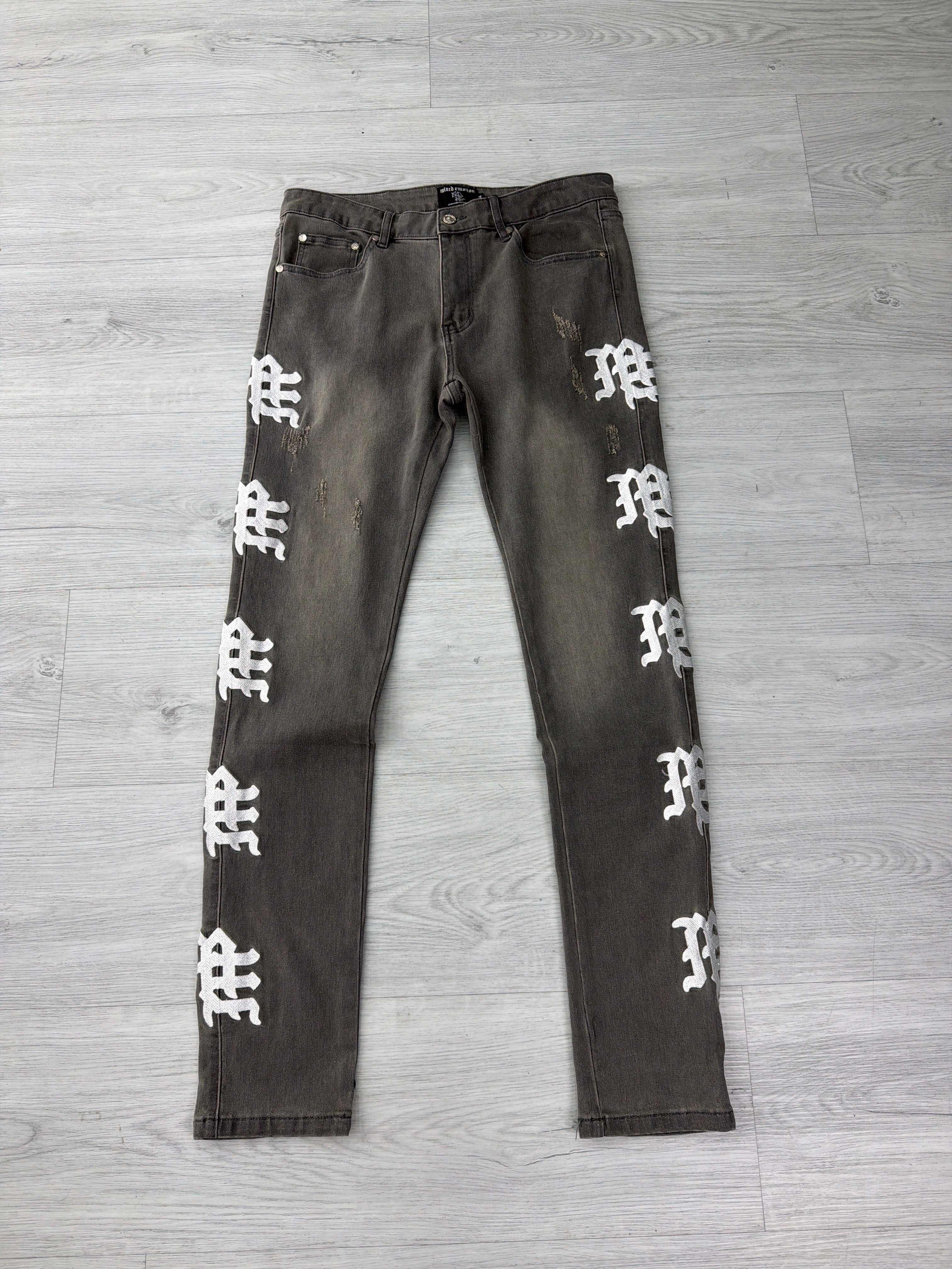 Mixed Emotions blue and black side logo jeans